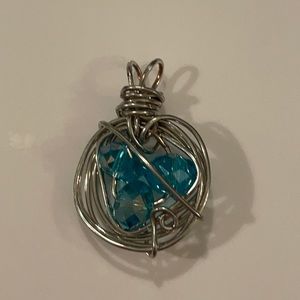 Silver tone pendant